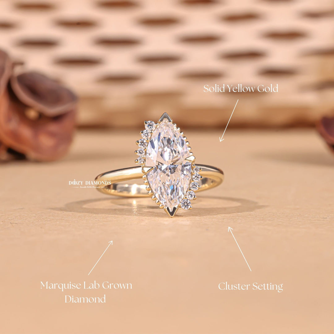 Certified marquise cut diamond featured in cluster engagement ring