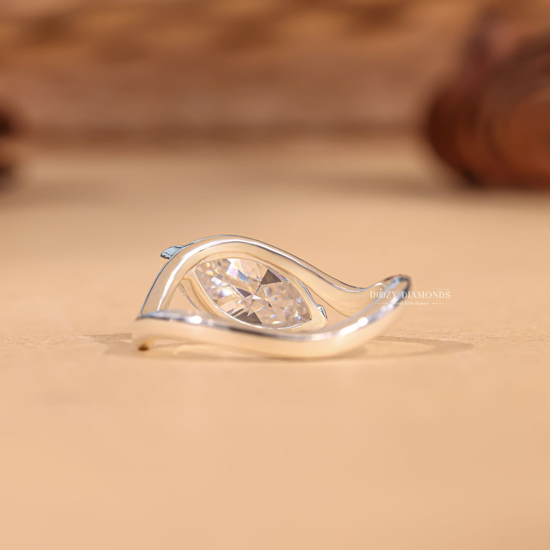 Top-down view of marquise cut solitaire engagement ring