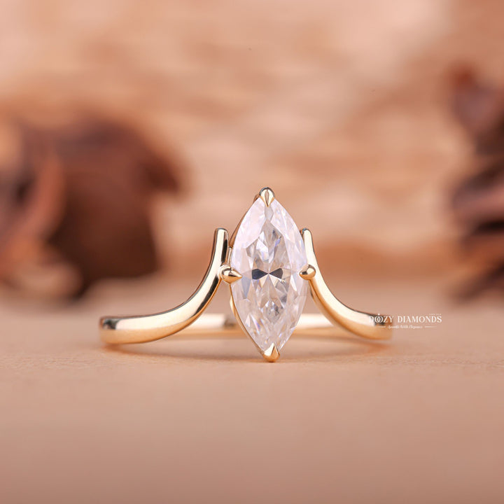Marquise solitaire ring set with an IGI graded diamond