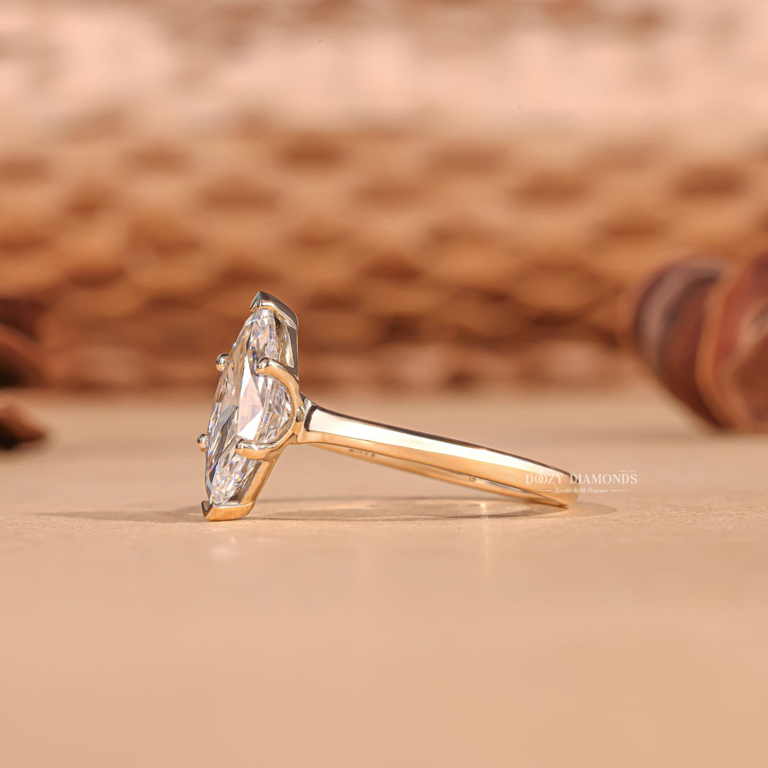 Marquise solitaire lab grown diamond ring fitted on finger
