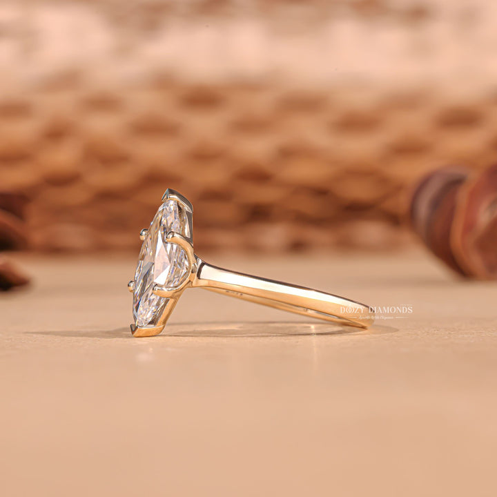 Marquise solitaire lab grown diamond ring fitted on finger