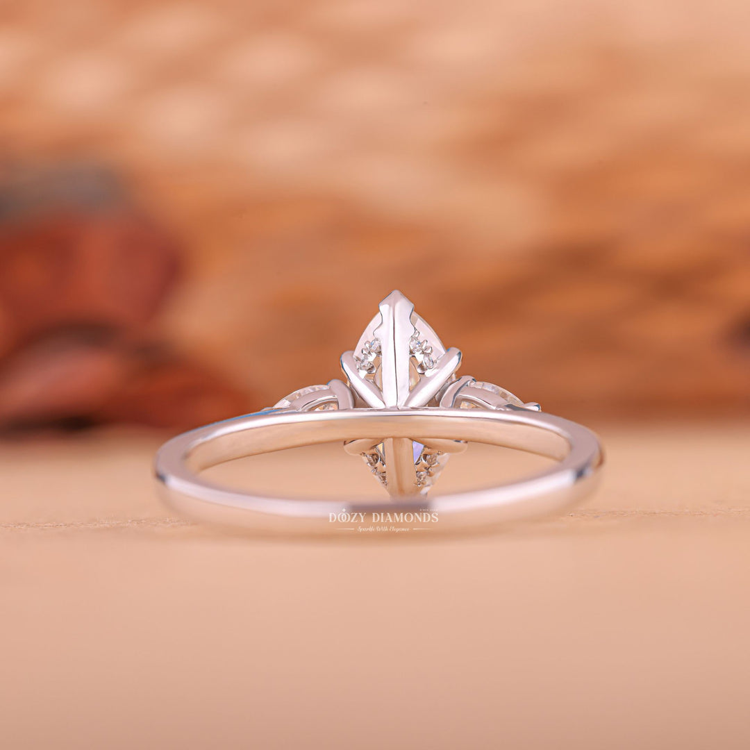 Classic marquise three stone engagement ring crafted for everyday wear