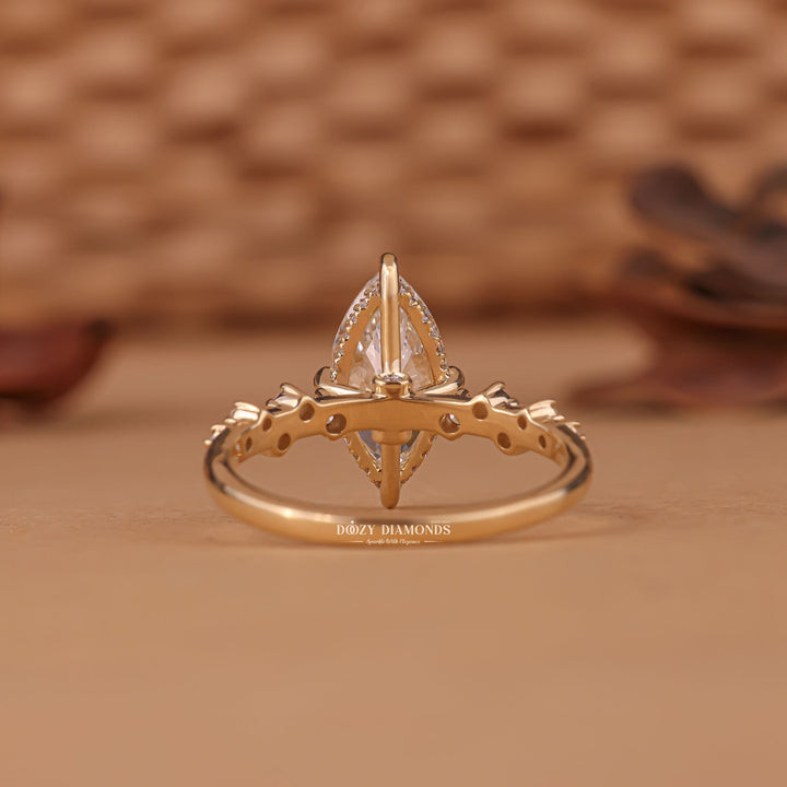 Side angle of marquise cluster diamond engagement ring