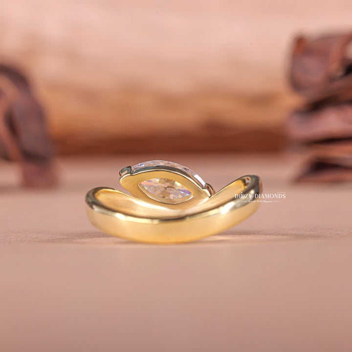 Marquise solitaire engagement ring close-up highlighting diamond sparkle