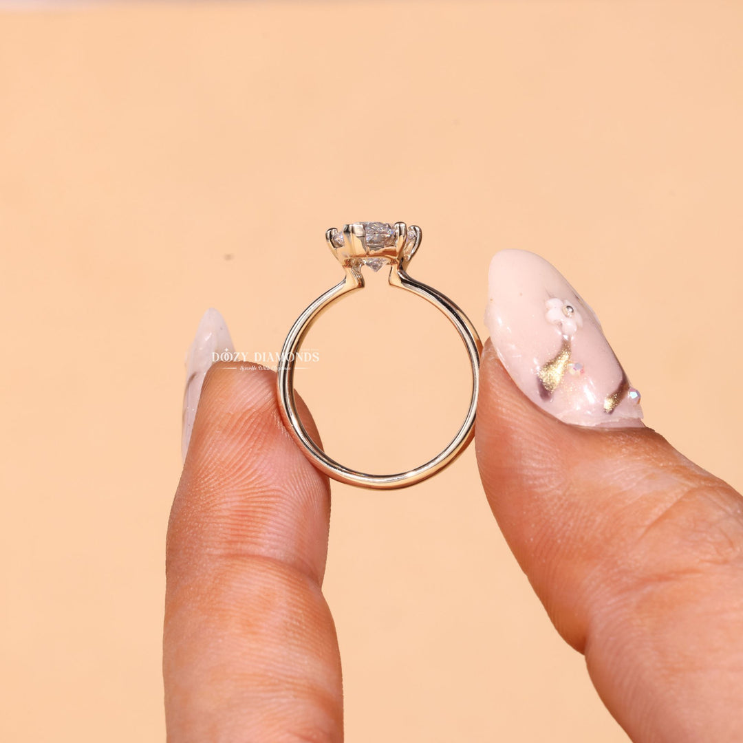 Marquise solitaire engagement ring viewed from the side