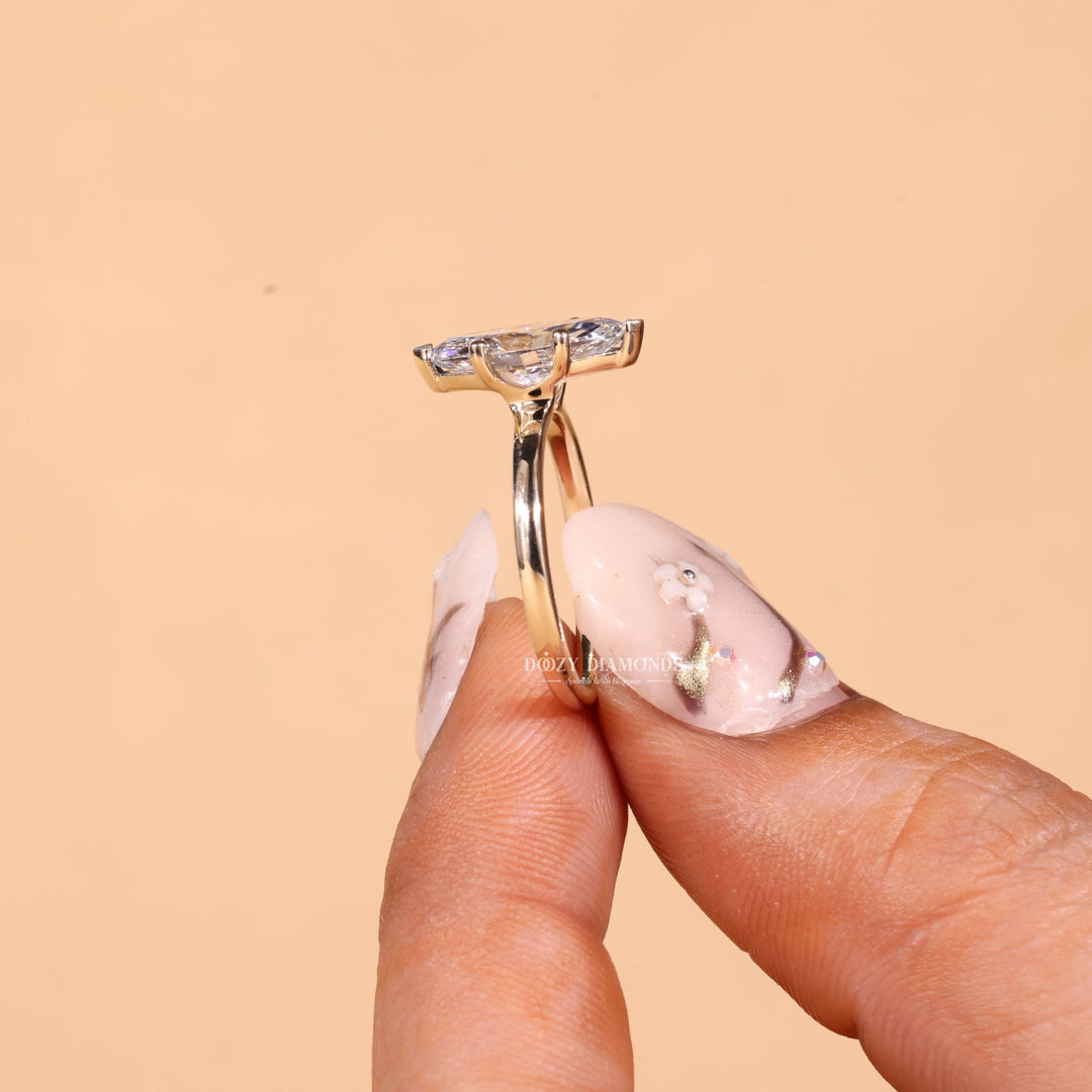 Profile view of marquise cut solitaire engagement ring band