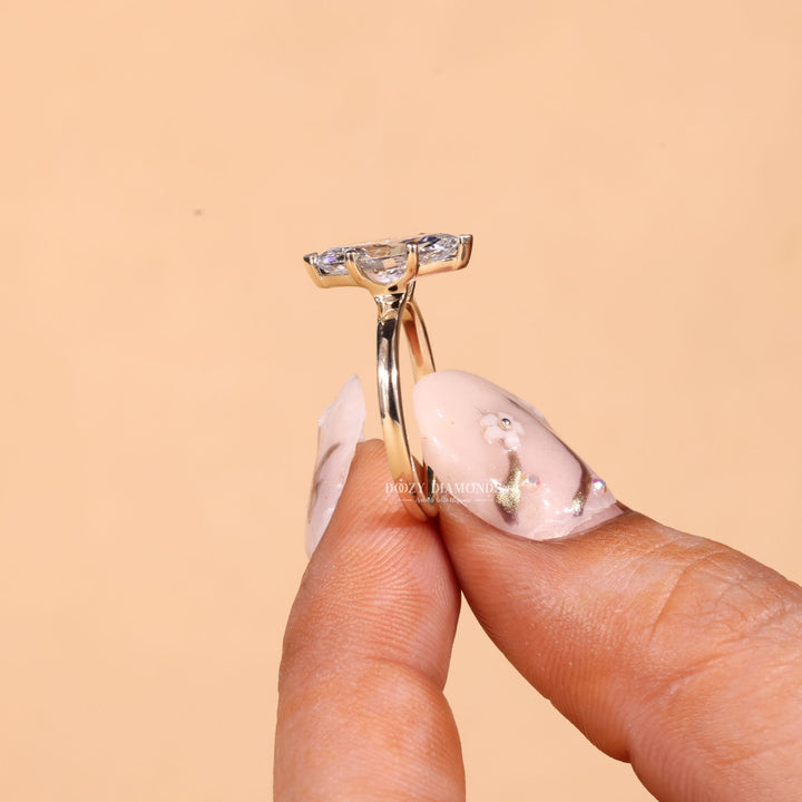 Profile view of marquise cut solitaire engagement ring band