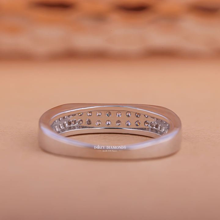 Anniversary diamond band stacked with engagement ring