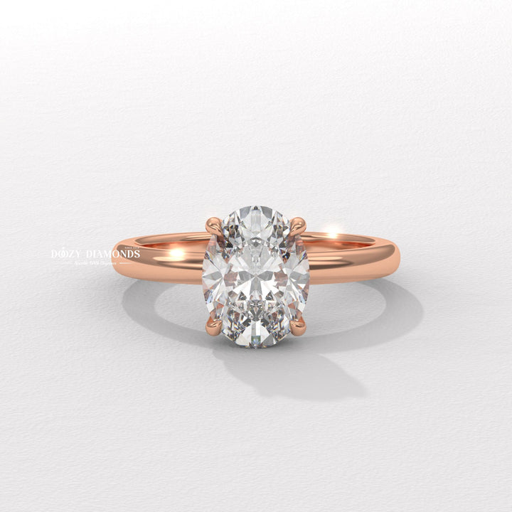 Oval hidden halo lab grown diamond ring side profile in gold setting