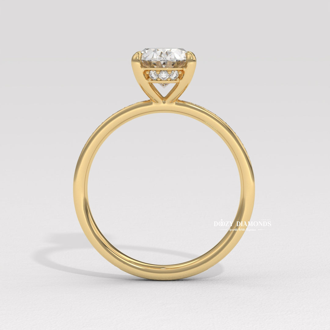 Close-up of oval cut center diamond in solitaire engagement ring