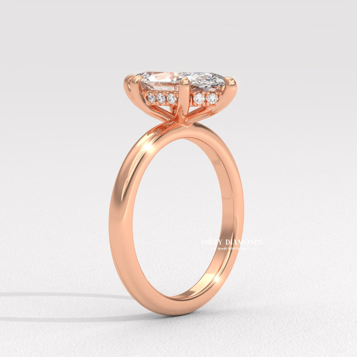 Marquise cut hidden halo engagement ring with IGI certified center diamond