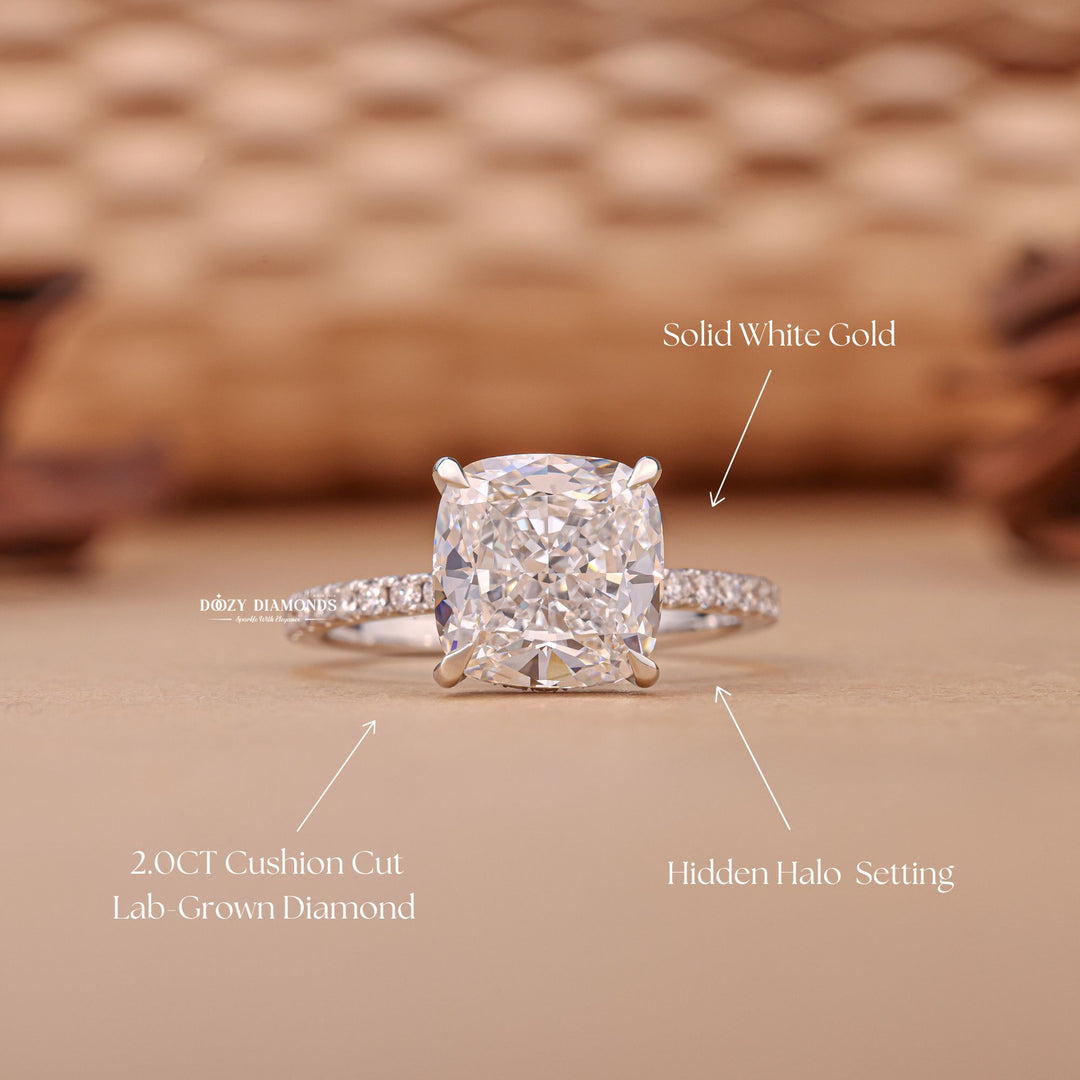 Cushion hidden halo engagement ring viewed from the side