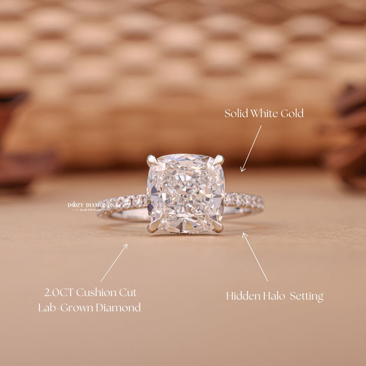 Cushion hidden halo engagement ring viewed from the side