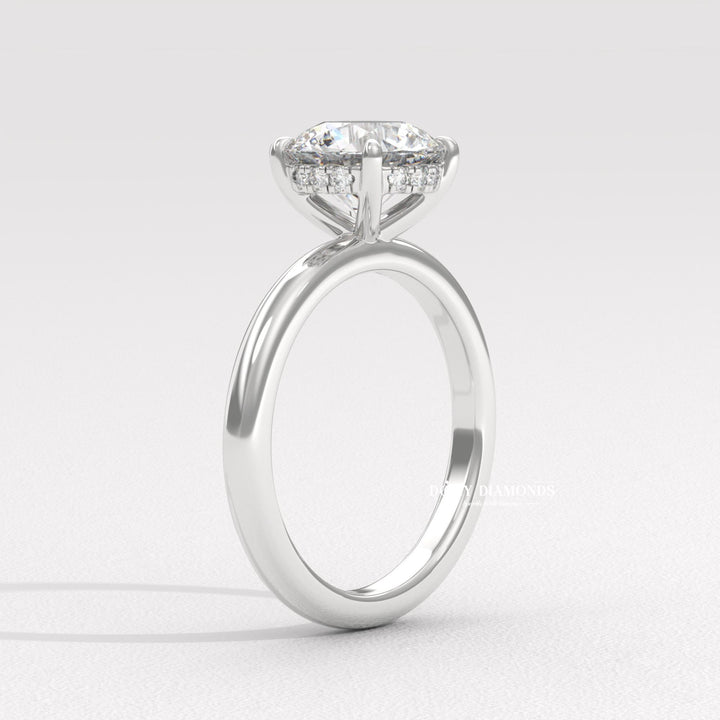 Round hidden halo engagement ring with brilliant diamond sparkle