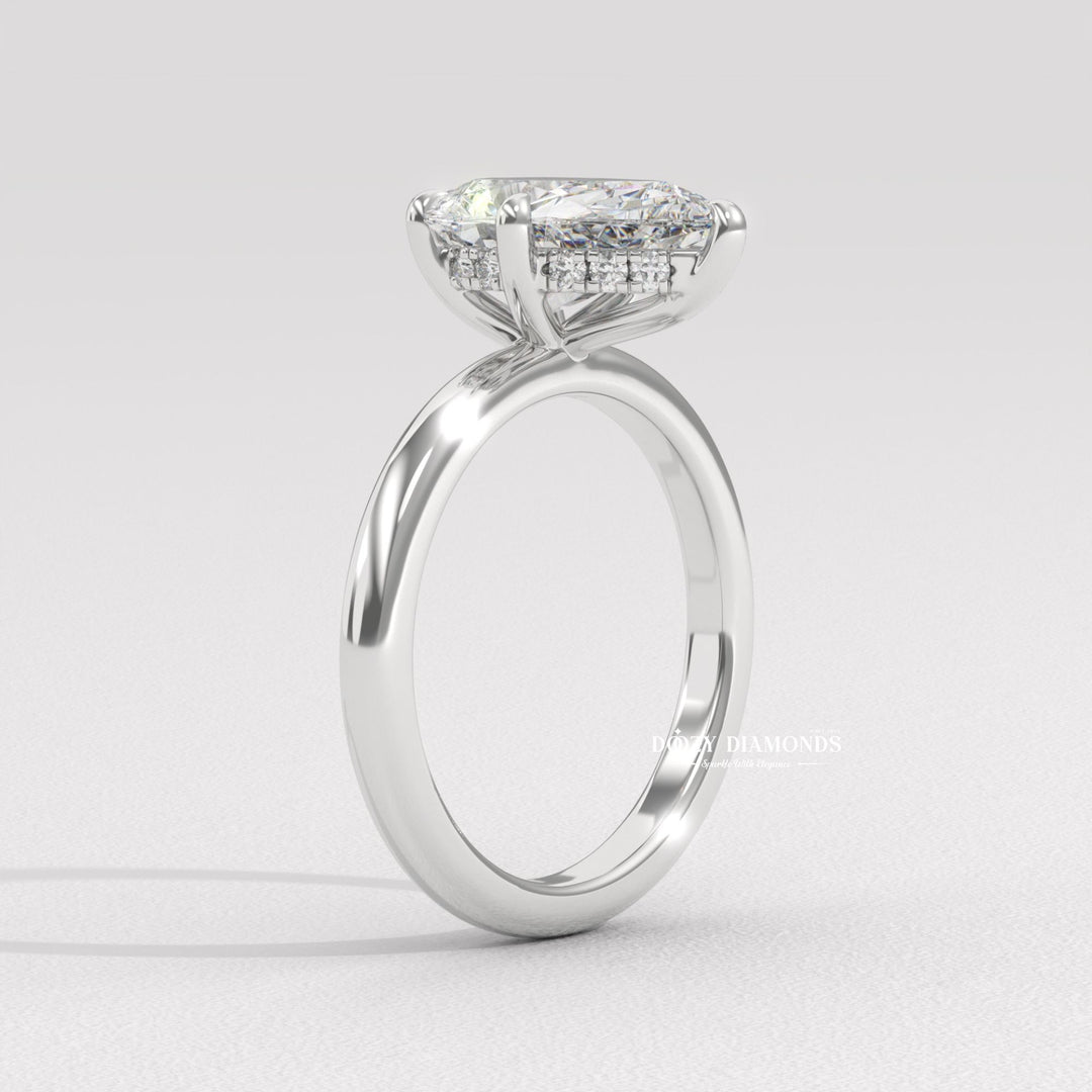 Handcrafted pear cut hidden halo lab grown diamond engagement ring
