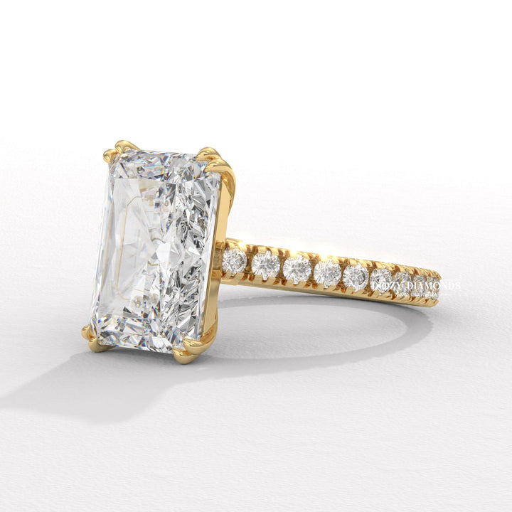 Close-up of radiant cut center diamond in solitaire engagement ring