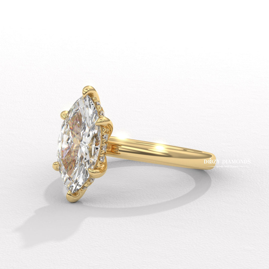 Marquise cut hidden halo engagement ring shown in real-life wear