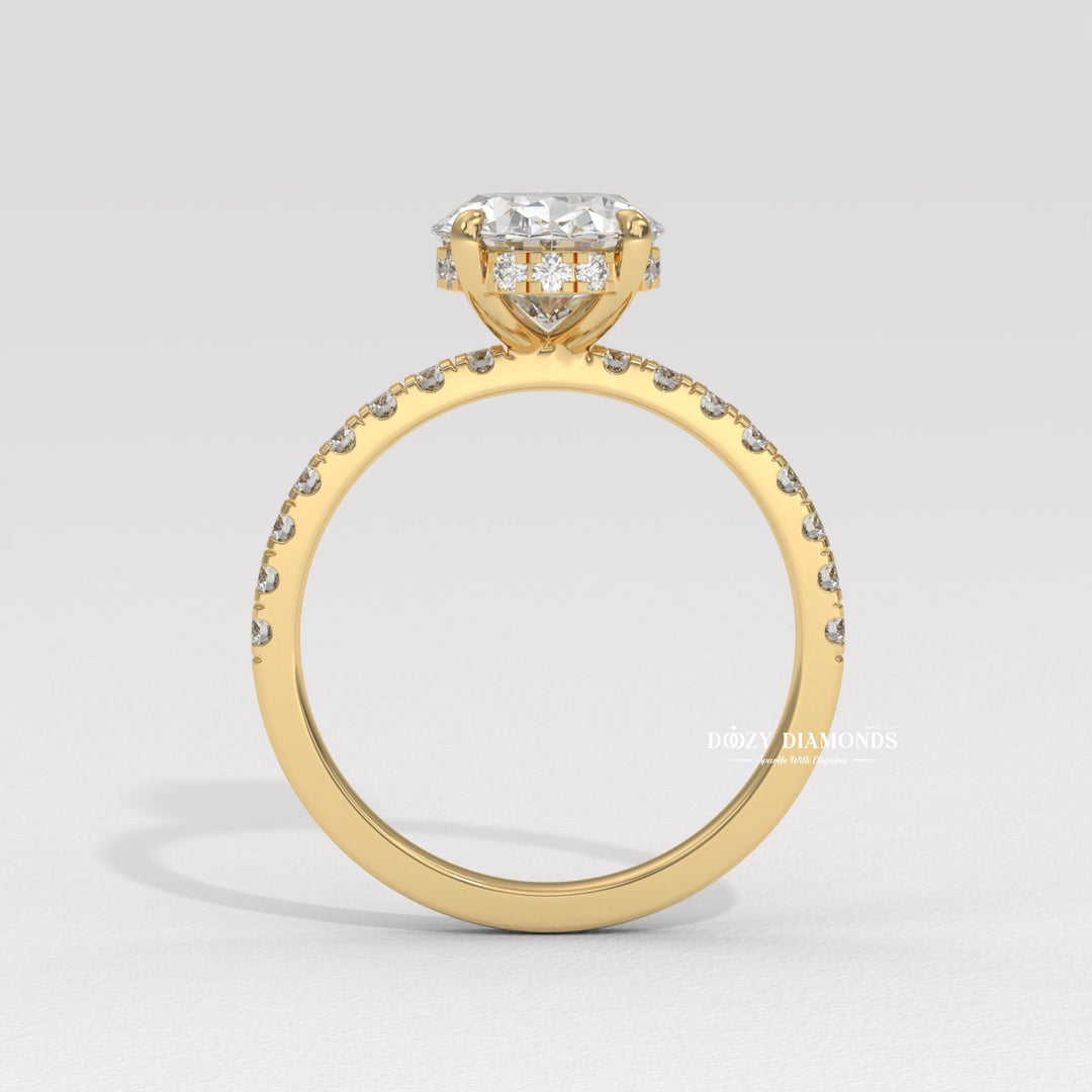 Oval hidden halo engagement ring close-up showing high clarity diamond clarity