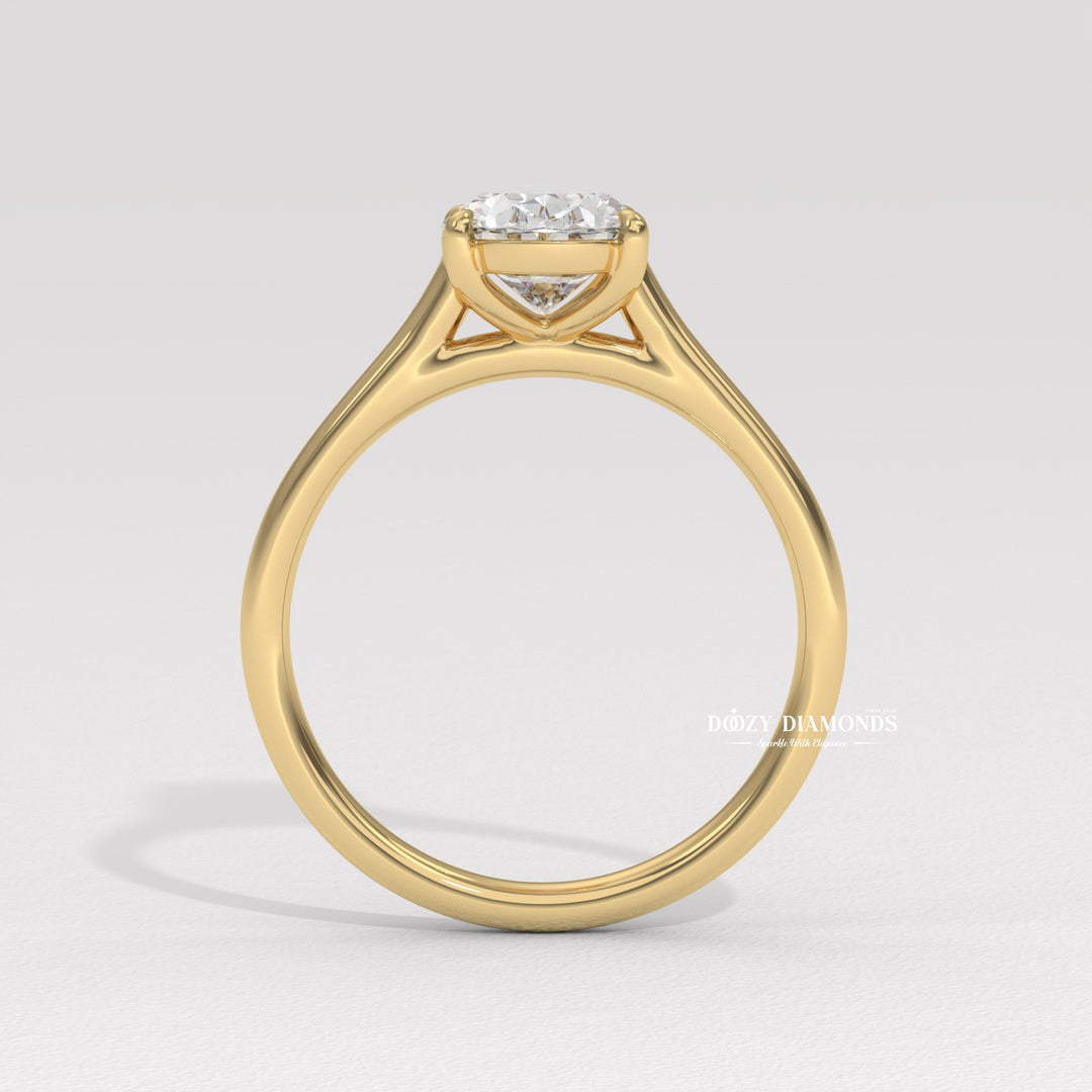 Oval solitaire engagement ring viewed from the side