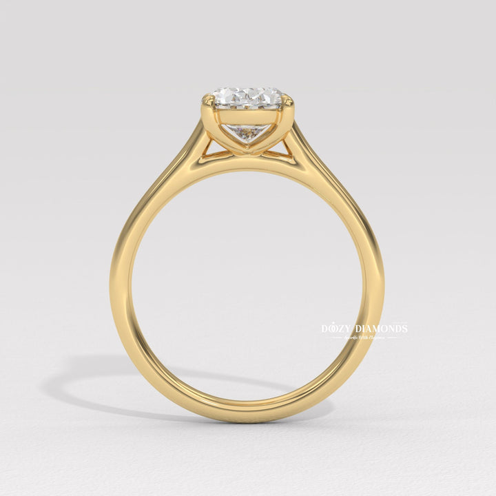 Oval solitaire engagement ring viewed from the side