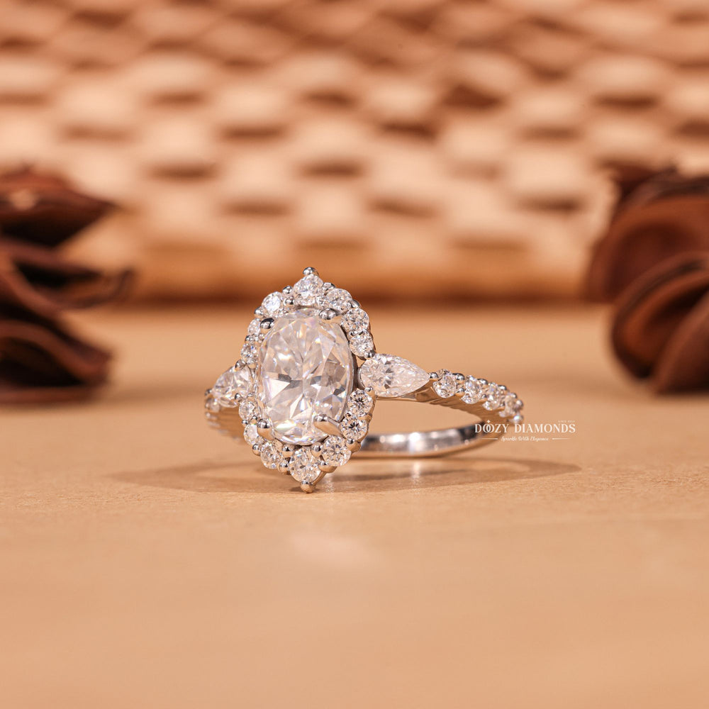 Oval cut engagement ring shown with authenticity certificate
