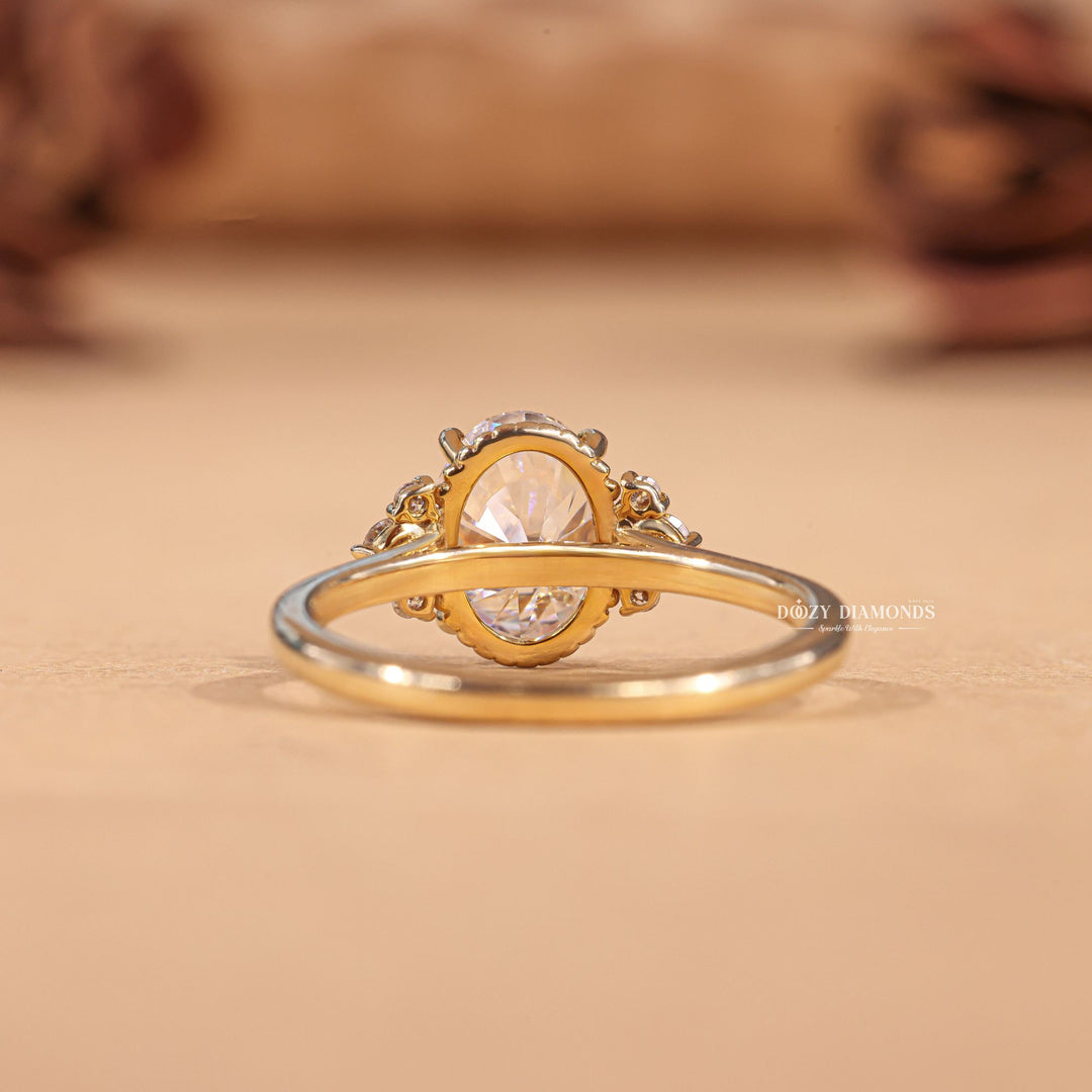 Oval cut diamond ring worn on hand