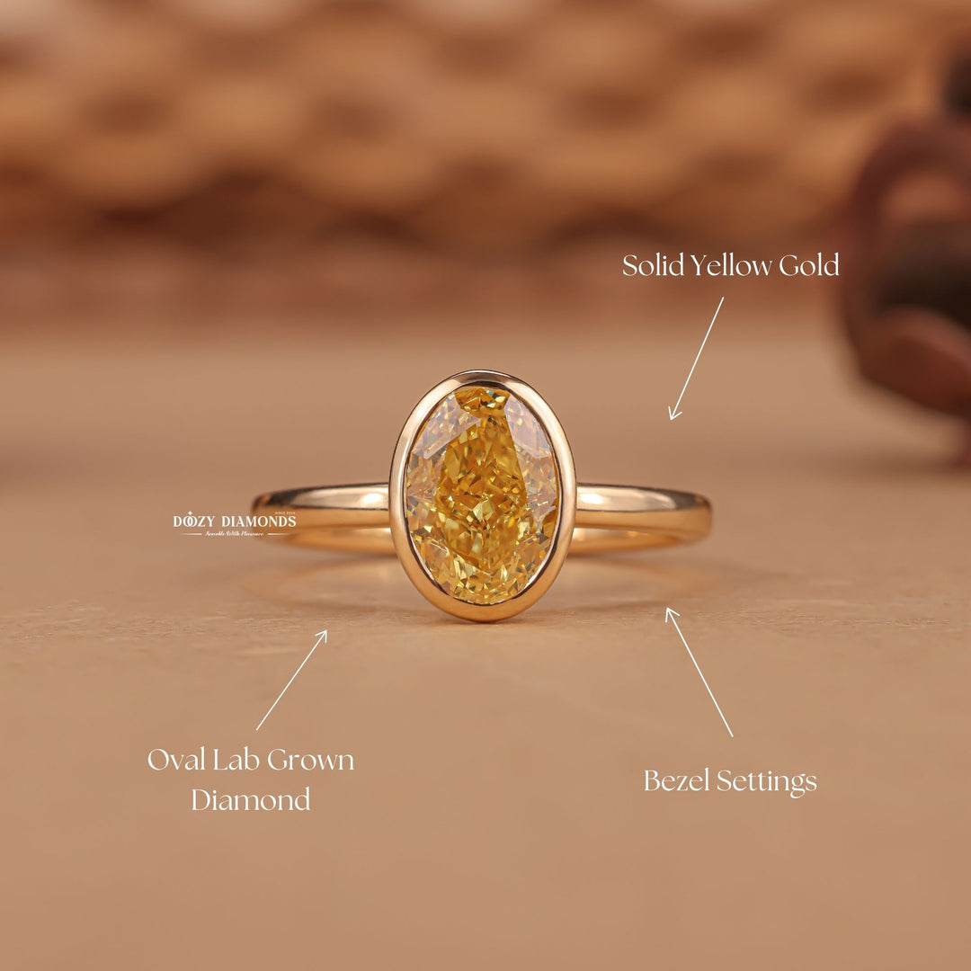 Oval cut bezel engagement ring shown in real-life wear