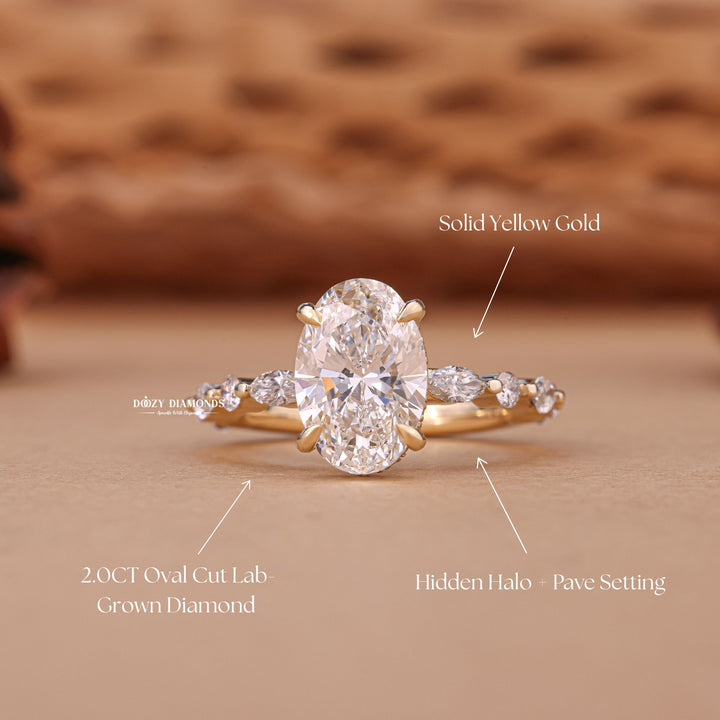 Oval cut diamond ring worn on hand