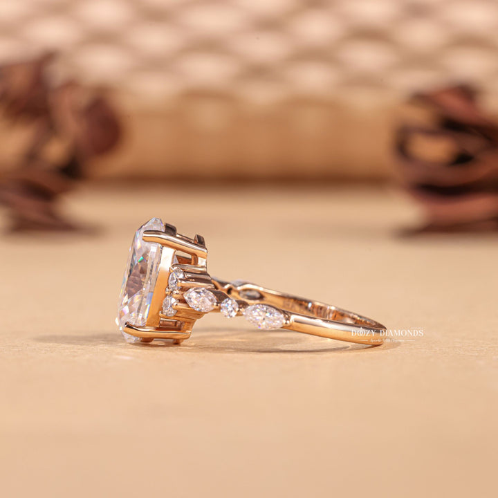 Macro shot of oval cut diamond facets in cluster ring setting