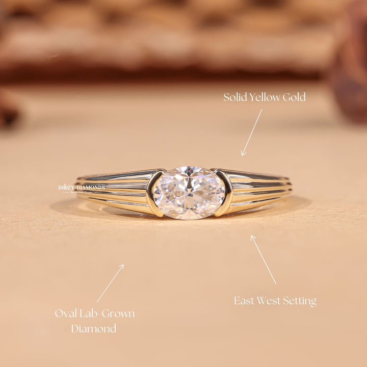 IGI certified oval cut diamond in east west engagement ring setting