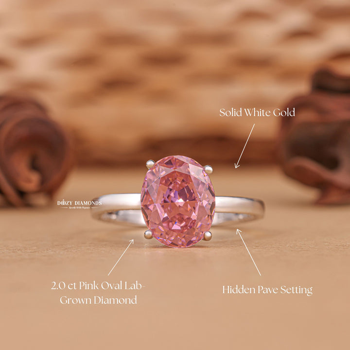 Close-up of oval cut center diamond in pave engagement ring