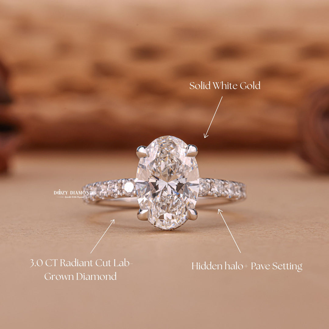 Profile view of oval cut hidden halo engagement ring band