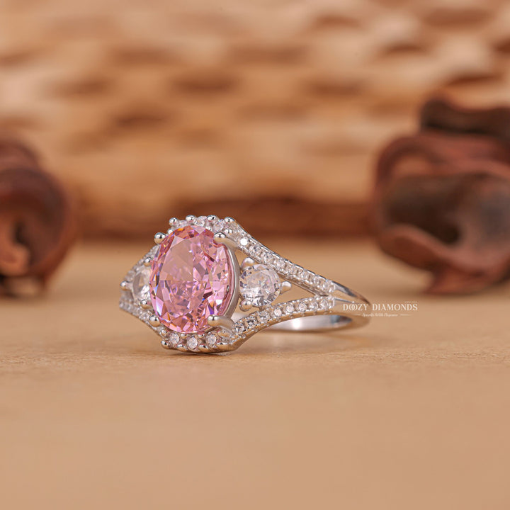 Oval cut engagement ring shown with authenticity certificate