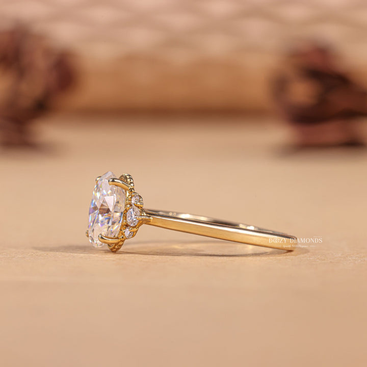 Oval cluster lab grown diamond ring fitted on finger