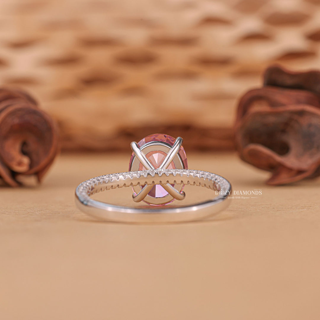 Oval pave engagement ring close-up highlighting diamond sparkle