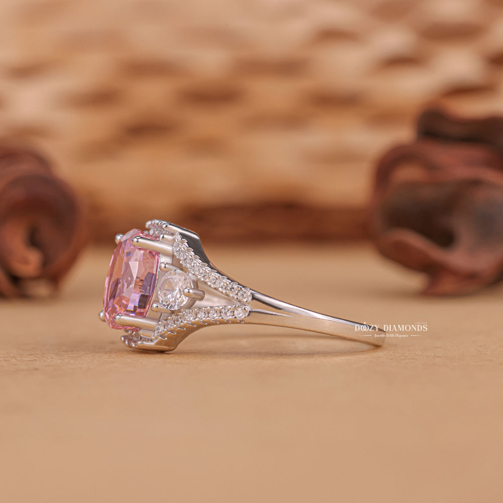 Oval three stone diamond ring presented in signature gift packaging