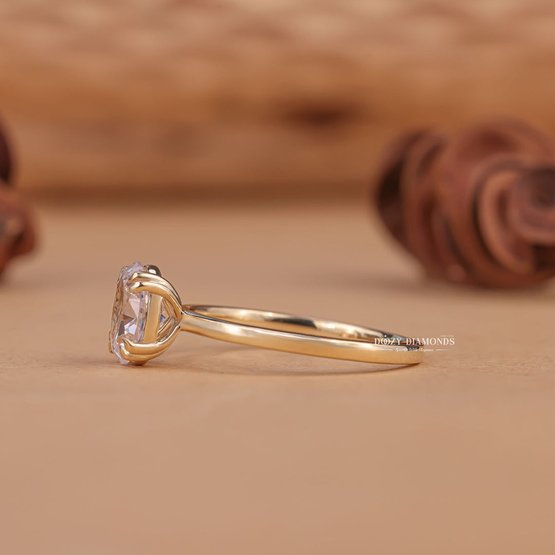Oval solitaire engagement ring close-up highlighting diamond sparkle