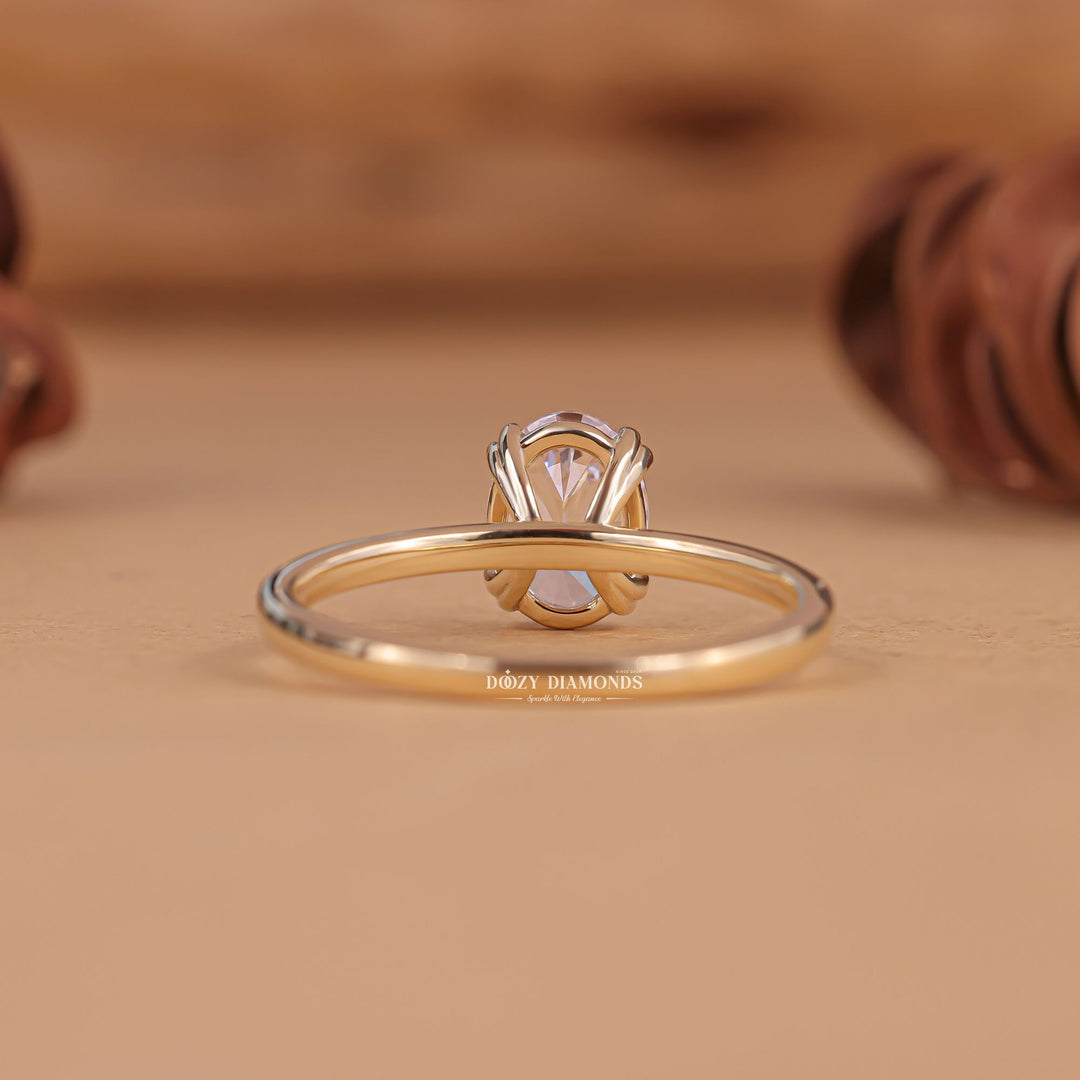 Macro shot of oval cut diamond facets in solitaire ring setting