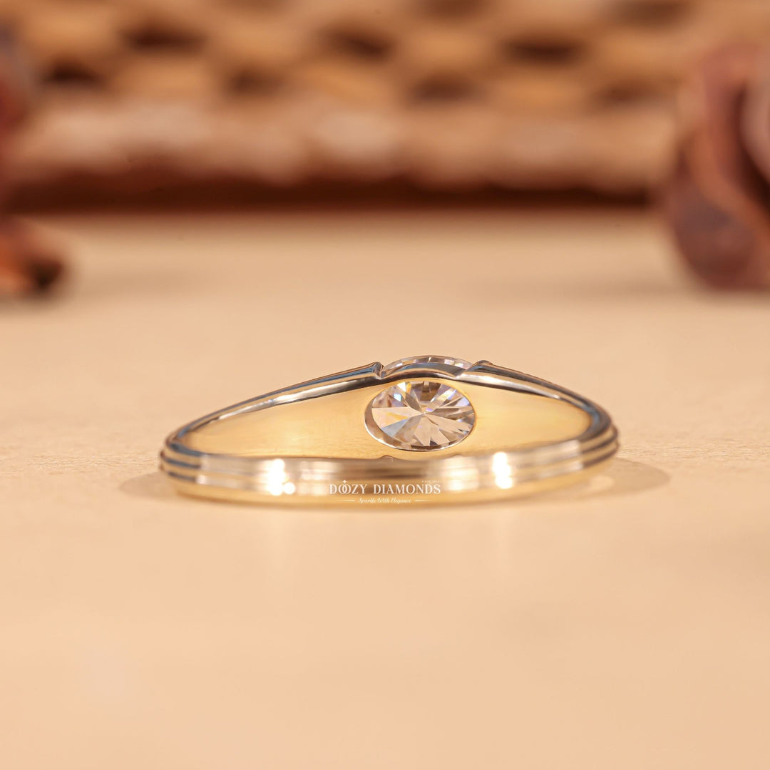 Oval cut east west engagement ring with IGI certified center diamond