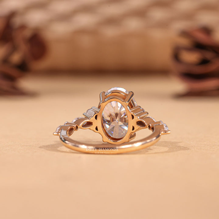 Oval cluster engagement ring close-up highlighting diamond sparkle