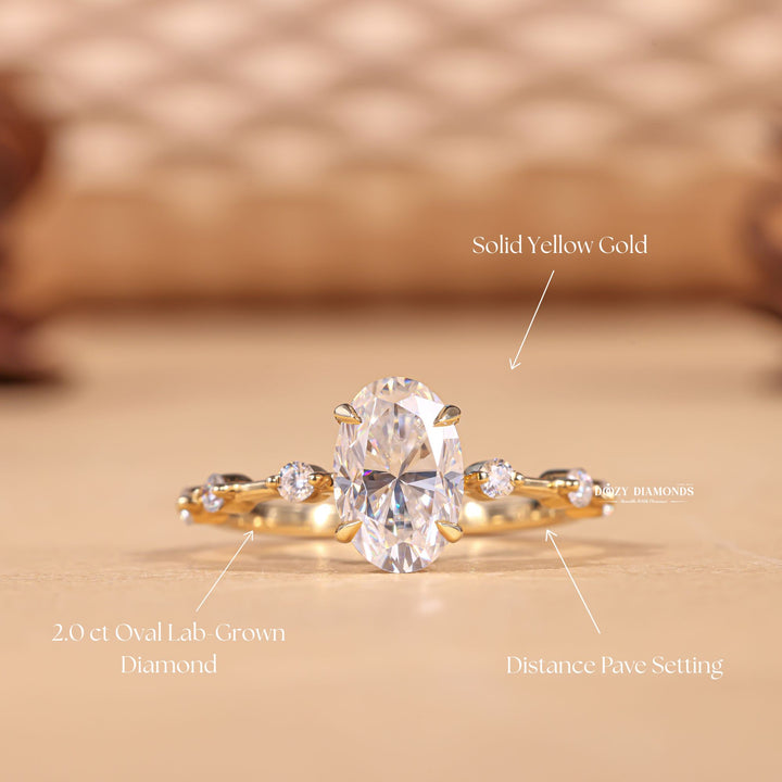 Oval pave engagement ring finished in polished solid gold