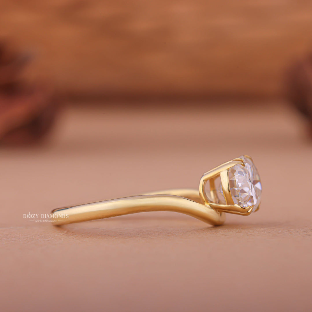 Oval east west engagement ring close-up highlighting diamond sparkle