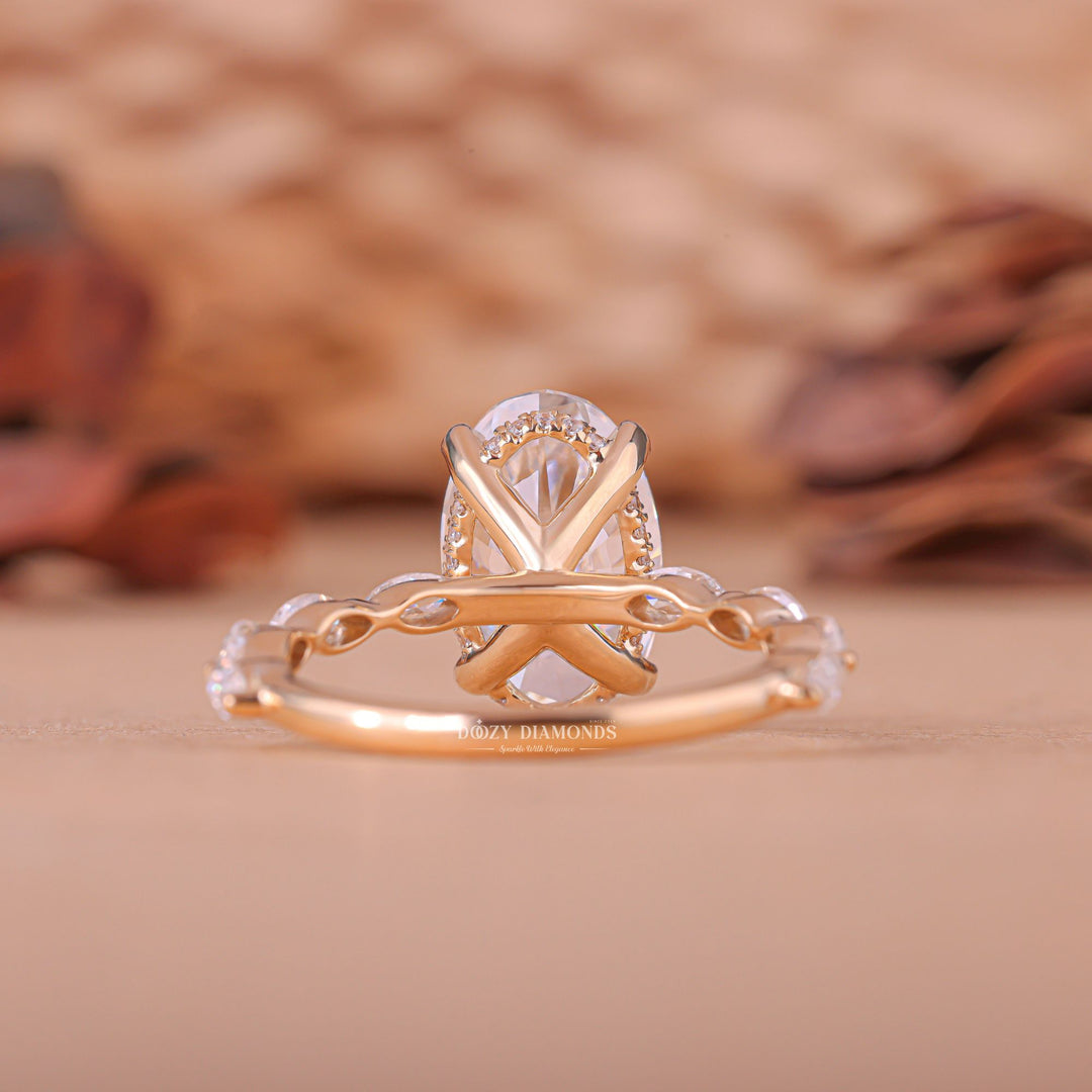 Detailed close-up of oval pave diamond engagement ring