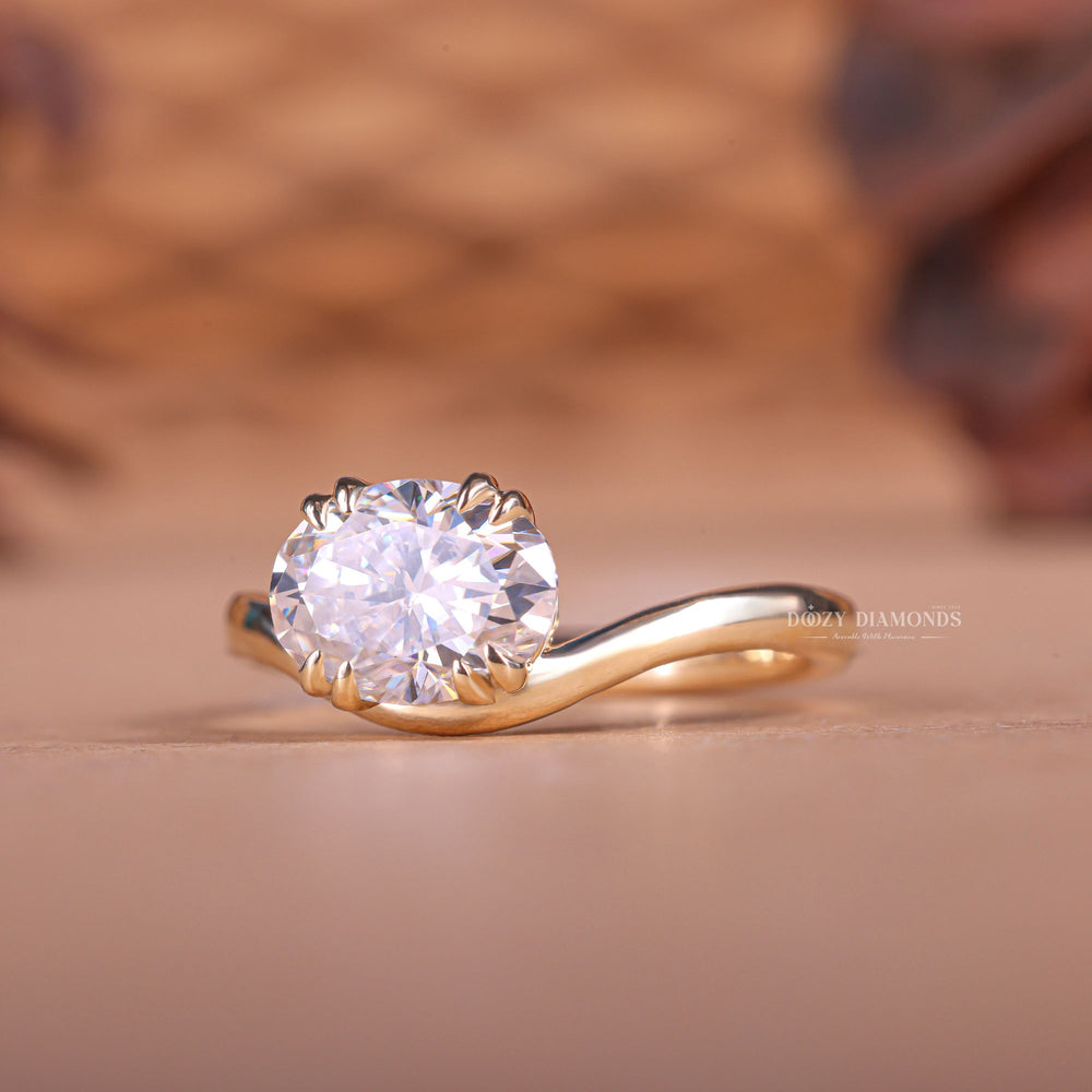 Top-down view of oval cut east west engagement ring