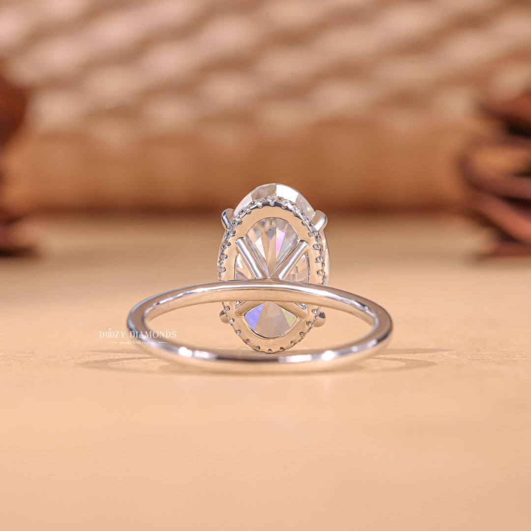 Oval hidden halo lab grown diamond ring side profile in gold setting