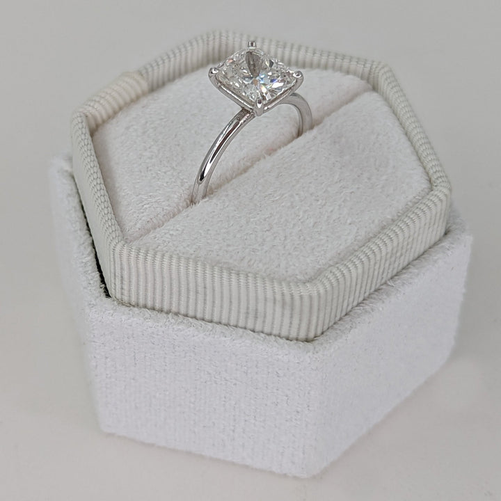 Cushion solitaire engagement ring with IGI certificate and packaging