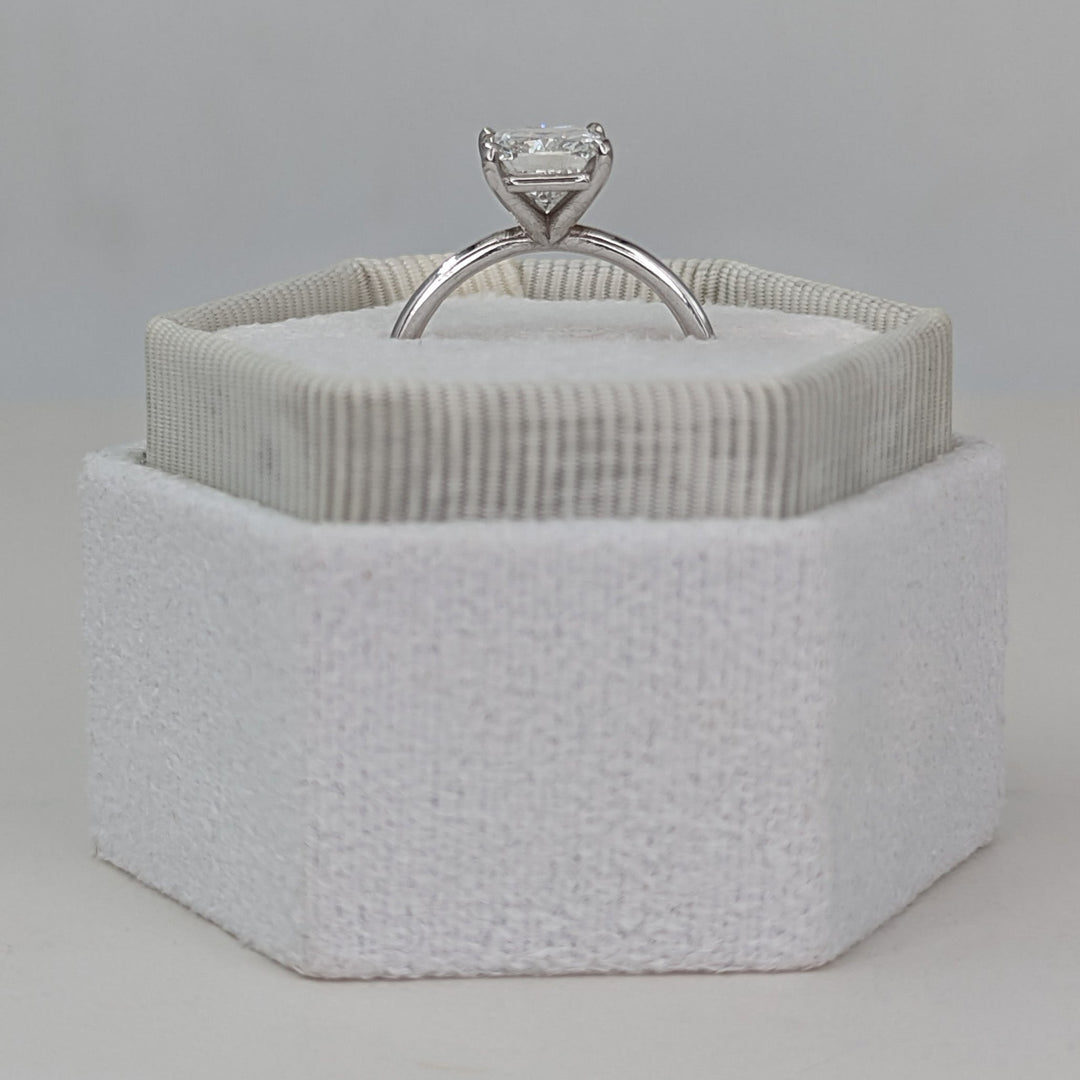 Unboxing view of cushion cut solitaire diamond engagement ring