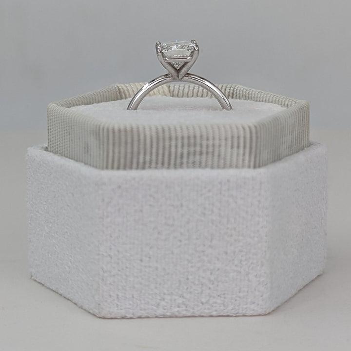 Unboxing view of cushion cut solitaire diamond engagement ring