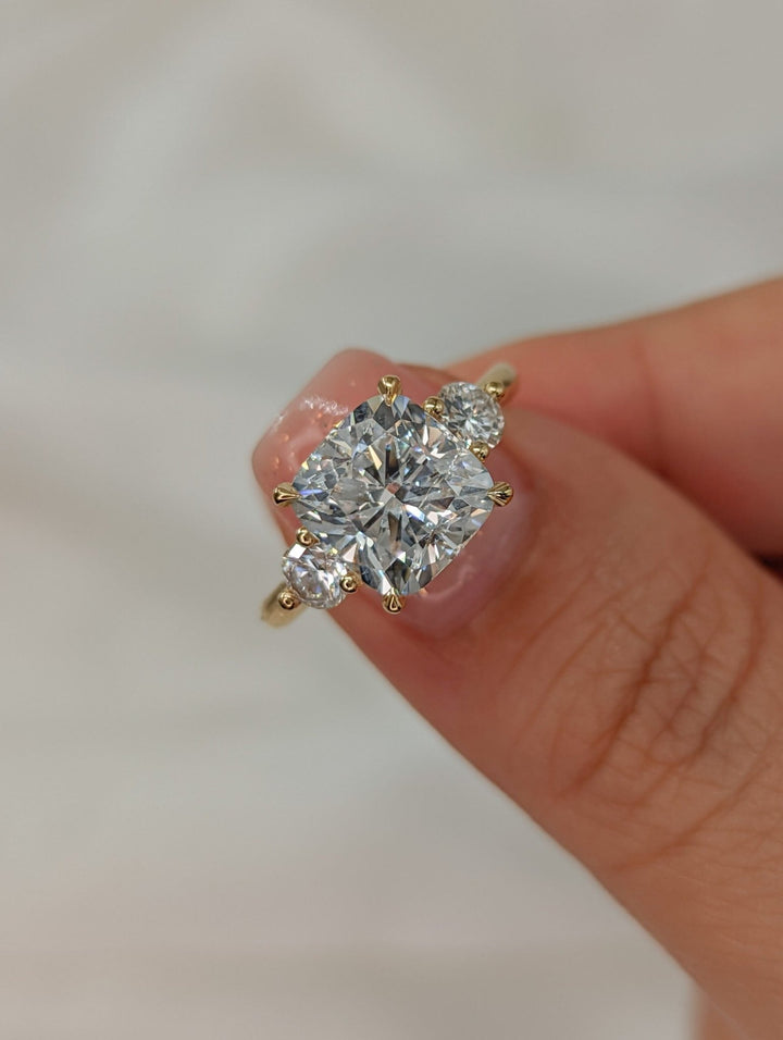 Close-up of cushion cut center diamond in solitaire engagement ring