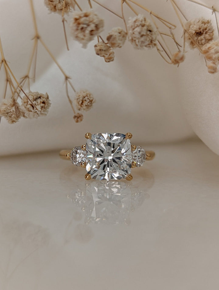 Cushion solitaire lab grown diamond ring side profile in gold setting